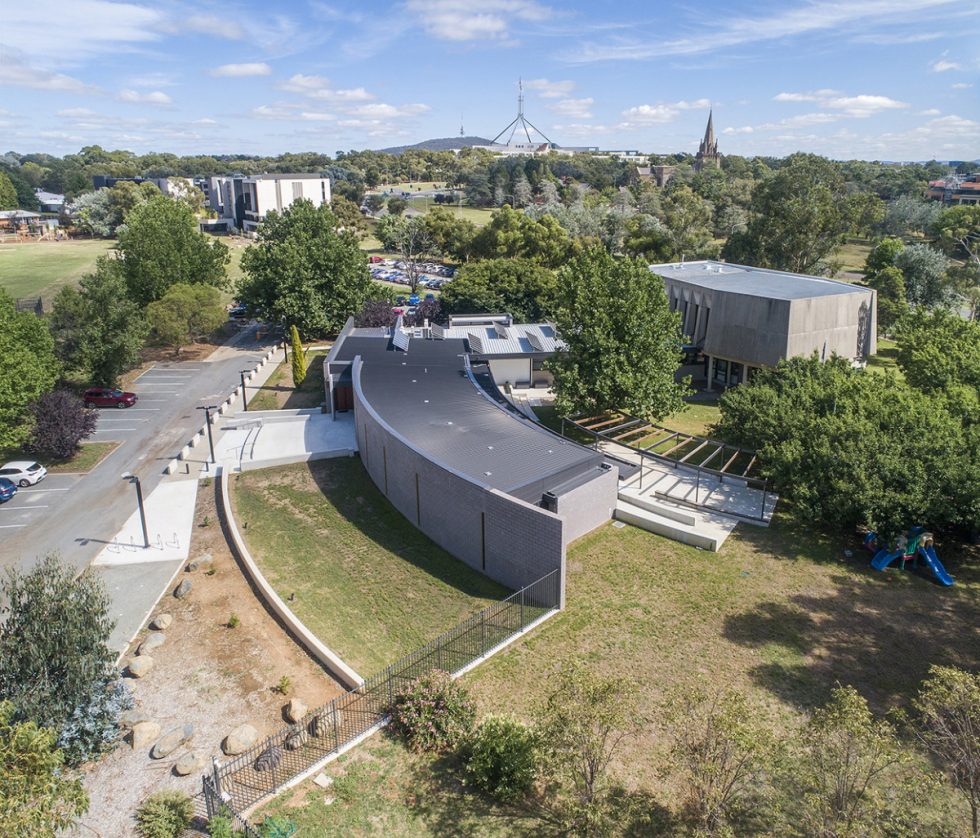 Aerial view of the National Jewish Memorial Centre, showing curved section of building. Commercial energy efficiency compliance by Powerhaus.