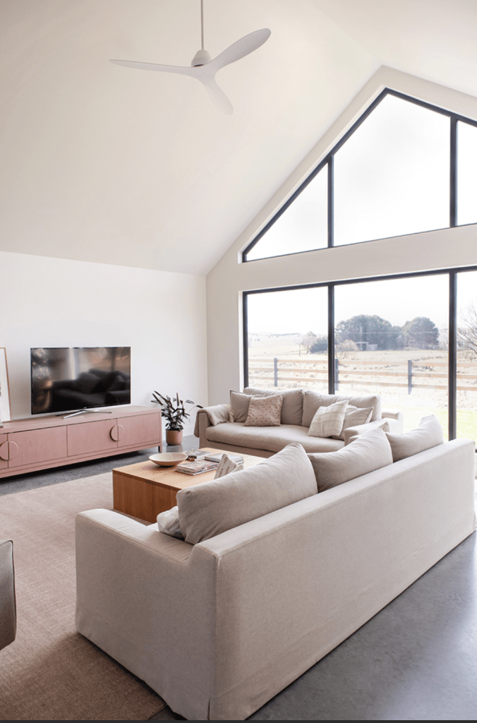 Image of a high performance home with large north facing windows.
