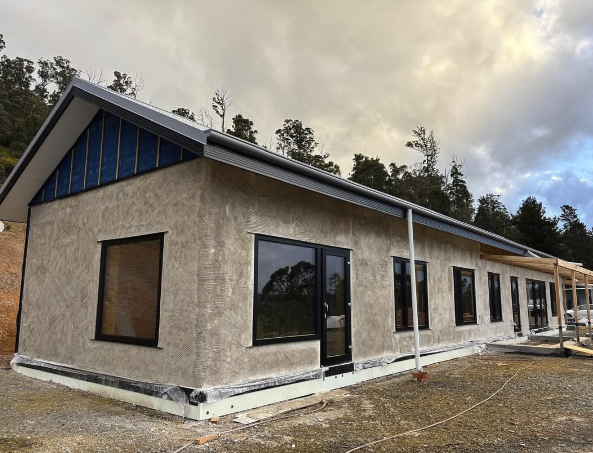 Image shows a strawbale 9 star home with newly rendered walls in Deloraine.
