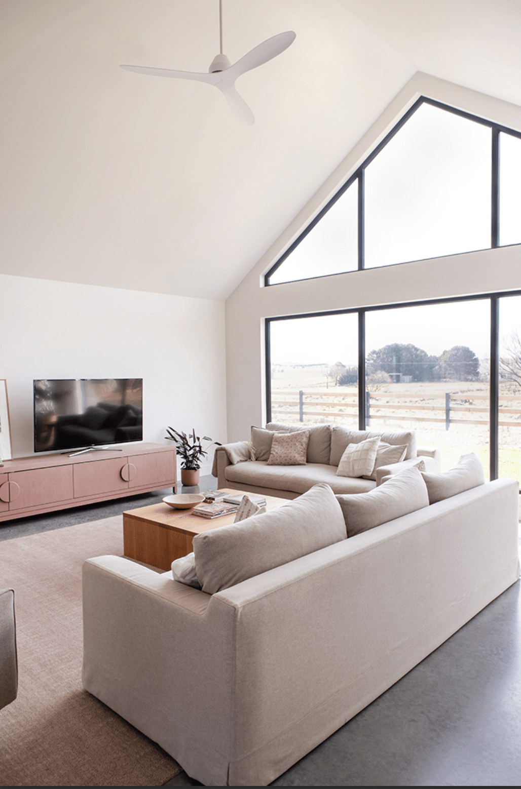 Image of a high performance home with large north facing windows.